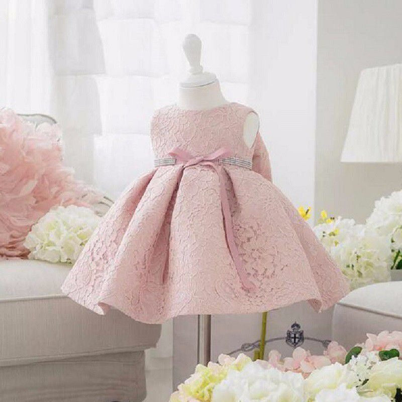 Adorable one-year-old baby girl princess dress, perfect for little royals.