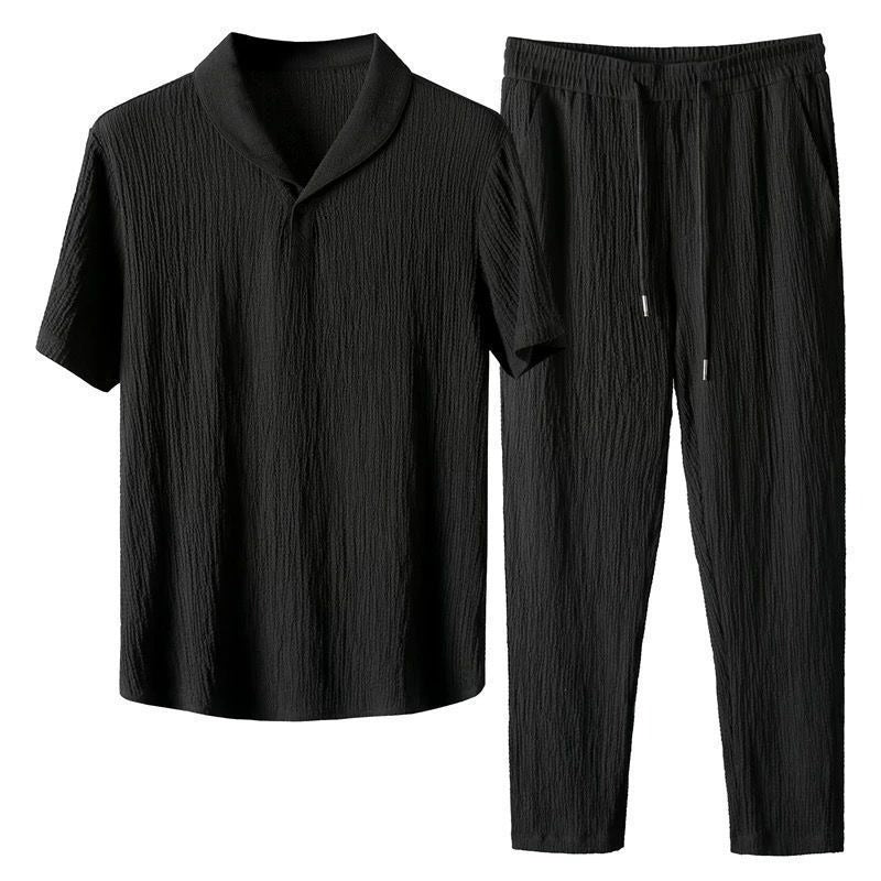 Light and breathable pleated casual sports suit for men, featuring a fashionable lapel design with short sleeves and trousers in a two-piece set.