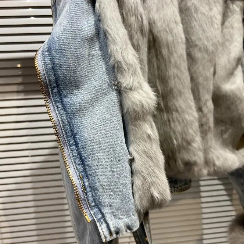 Women's denim coat with fox fur collar, rabbit lining, metal buckle, zipper, belt, high waist.